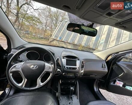 Черный Хендай их35, объемом двигателя 2 л и пробегом 137 тыс. км за 14000 $, фото 11 на Automoto.ua