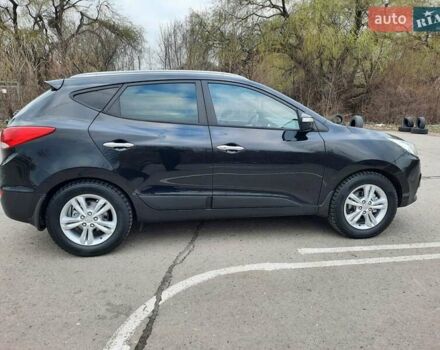 Чорний Хендай іх35, об'ємом двигуна 2 л та пробігом 211 тис. км за 12700 $, фото 19 на Automoto.ua