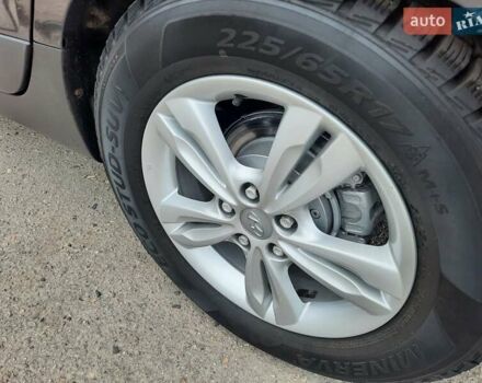 Чорний Хендай іх35, об'ємом двигуна 2 л та пробігом 211 тис. км за 12700 $, фото 83 на Automoto.ua