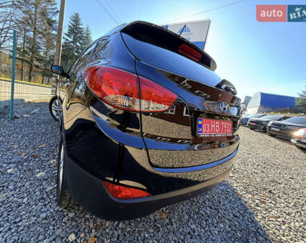 Чорний Хендай іх35, об'ємом двигуна 2 л та пробігом 153 тис. км за 13999 $, фото 17 на Automoto.ua