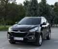 Чорний Хендай іх35, об'ємом двигуна 2 л та пробігом 173 тис. км за 13800 $, фото 1 на Automoto.ua