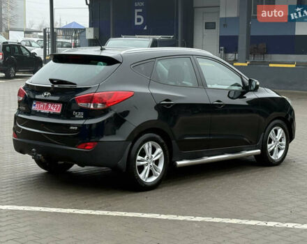 Черный Хендай их35, объемом двигателя 2 л и пробегом 230 тыс. км за 11850 $, фото 6 на Automoto.ua