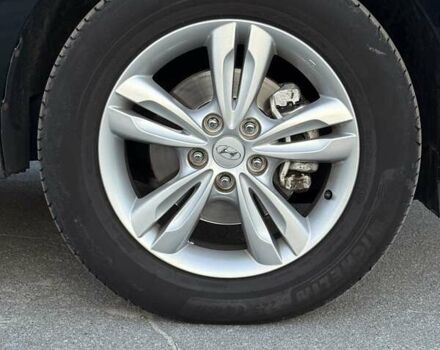 Чорний Хендай іх35, об'ємом двигуна 2 л та пробігом 173 тис. км за 13800 $, фото 26 на Automoto.ua