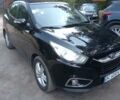 Чорний Хендай іх35, об'ємом двигуна 1.7 л та пробігом 300 тис. км за 10300 $, фото 7 на Automoto.ua