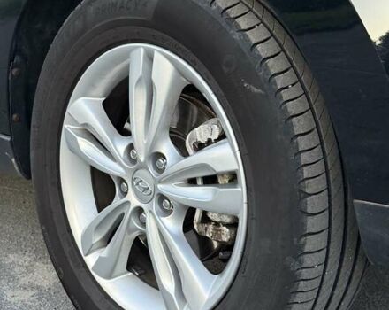 Чорний Хендай іх35, об'ємом двигуна 2 л та пробігом 173 тис. км за 13800 $, фото 24 на Automoto.ua