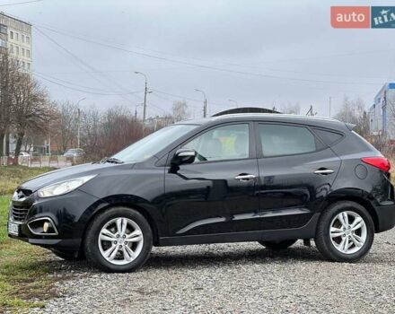 Чорний Хендай іх35, об'ємом двигуна 2 л та пробігом 195 тис. км за 12800 $, фото 21 на Automoto.ua