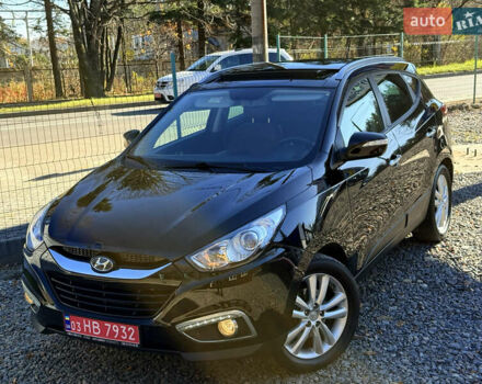 Чорний Хендай іх35, об'ємом двигуна 2 л та пробігом 153 тис. км за 13999 $, фото 4 на Automoto.ua