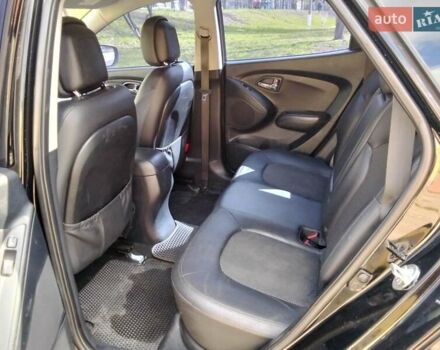 Чорний Хендай іх35, об'ємом двигуна 2 л та пробігом 180 тис. км за 12999 $, фото 9 на Automoto.ua