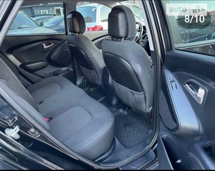 Чорний Хендай іх35, об'ємом двигуна 2 л та пробігом 148 тис. км за 12800 $, фото 5 на Automoto.ua