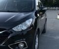 Чорний Хендай іх35, об'ємом двигуна 2 л та пробігом 173 тис. км за 13800 $, фото 4 на Automoto.ua