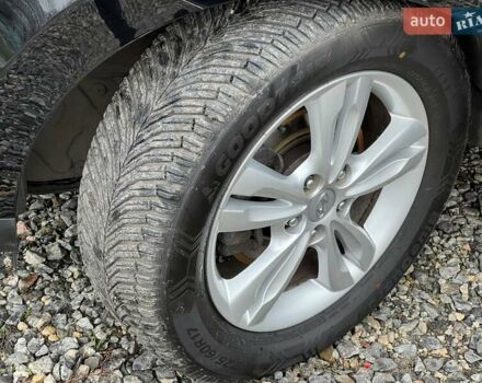 Чорний Хендай іх35, об'ємом двигуна 2 л та пробігом 195 тис. км за 12800 $, фото 3 на Automoto.ua