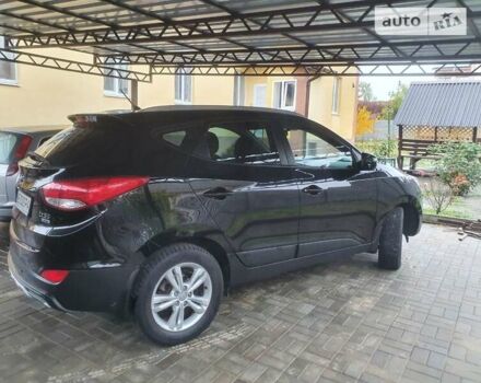 Чорний Хендай іх35, об'ємом двигуна 2 л та пробігом 148 тис. км за 12800 $, фото 3 на Automoto.ua