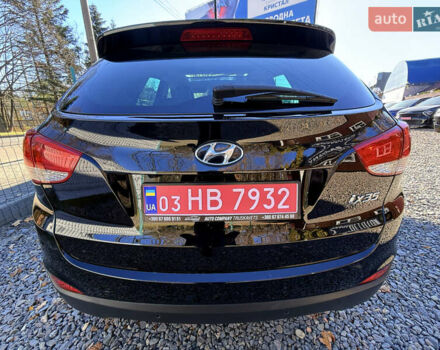 Чорний Хендай іх35, об'ємом двигуна 2 л та пробігом 153 тис. км за 13999 $, фото 15 на Automoto.ua