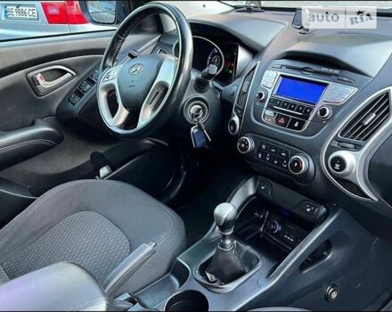 Чорний Хендай іх35, об'ємом двигуна 2 л та пробігом 148 тис. км за 12800 $, фото 8 на Automoto.ua