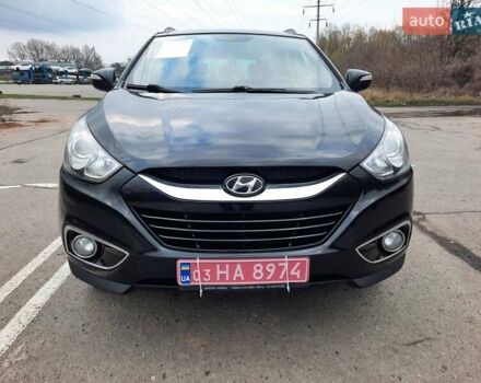 Чорний Хендай іх35, об'ємом двигуна 2 л та пробігом 211 тис. км за 12700 $, фото 26 на Automoto.ua