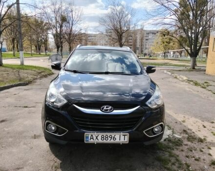 Чорний Хендай іх35, об'ємом двигуна 2 л та пробігом 180 тис. км за 12999 $, фото 1 на Automoto.ua