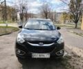 Чорний Хендай іх35, об'ємом двигуна 2 л та пробігом 180 тис. км за 12999 $, фото 1 на Automoto.ua