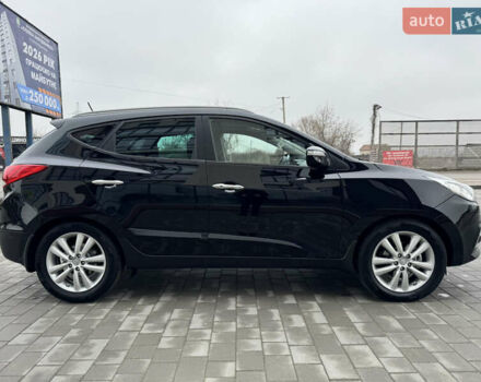 Черный Хендай их35, объемом двигателя 2 л и пробегом 177 тыс. км за 11999 $, фото 10 на Automoto.ua