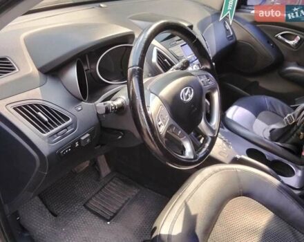 Чорний Хендай іх35, об'ємом двигуна 2 л та пробігом 180 тис. км за 12999 $, фото 17 на Automoto.ua