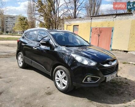 Чорний Хендай іх35, об'ємом двигуна 2 л та пробігом 180 тис. км за 12999 $, фото 1 на Automoto.ua
