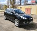 Чорний Хендай іх35, об'ємом двигуна 2 л та пробігом 180 тис. км за 12999 $, фото 1 на Automoto.ua