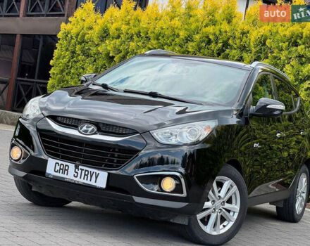 Черный Хендай их35, объемом двигателя 1.69 л и пробегом 238 тыс. км за 11999 $, фото 12 на Automoto.ua