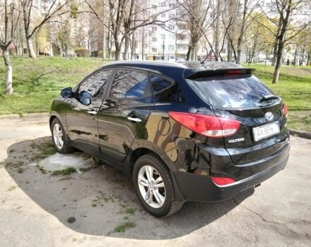 Чорний Хендай іх35, об'ємом двигуна 2 л та пробігом 180 тис. км за 12999 $, фото 6 на Automoto.ua