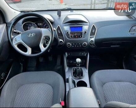 Чорний Хендай іх35, об'ємом двигуна 2 л та пробігом 148 тис. км за 12800 $, фото 7 на Automoto.ua