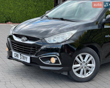 Черный Хендай их35, объемом двигателя 1.69 л и пробегом 238 тыс. км за 11999 $, фото 13 на Automoto.ua