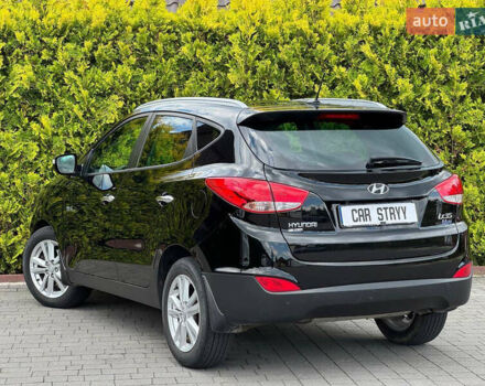 Черный Хендай их35, объемом двигателя 1.69 л и пробегом 238 тыс. км за 11999 $, фото 3 на Automoto.ua