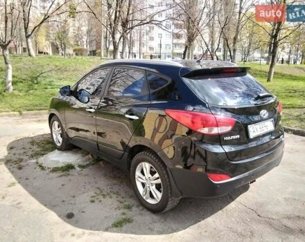 Чорний Хендай іх35, об'ємом двигуна 2 л та пробігом 180 тис. км за 12999 $, фото 5 на Automoto.ua