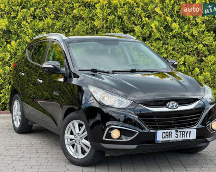 Черный Хендай их35, объемом двигателя 1.69 л и пробегом 238 тыс. км за 11999 $, фото 6 на Automoto.ua