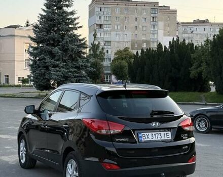 Чорний Хендай іх35, об'ємом двигуна 2 л та пробігом 173 тис. км за 13800 $, фото 10 на Automoto.ua