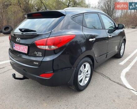 Чорний Хендай іх35, об'ємом двигуна 2 л та пробігом 211 тис. км за 12700 $, фото 90 на Automoto.ua