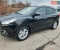 Чорний Хендай іх35, об'ємом двигуна 2 л та пробігом 211 тис. км за 12700 $, фото 122 на Automoto.ua