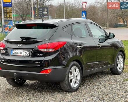 Чорний Хендай іх35, об'ємом двигуна 2 л та пробігом 195 тис. км за 12800 $, фото 12 на Automoto.ua