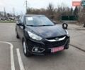 Чорний Хендай іх35, об'ємом двигуна 2 л та пробігом 211 тис. км за 12700 $, фото 2 на Automoto.ua