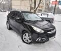 Чорний Хендай іх35, об'ємом двигуна 2 л та пробігом 180 тис. км за 12777 $, фото 1 на Automoto.ua