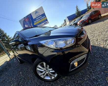 Чорний Хендай іх35, об'ємом двигуна 2 л та пробігом 153 тис. км за 13999 $, фото 7 на Automoto.ua