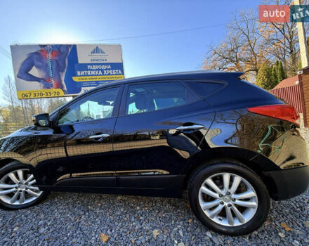 Чорний Хендай іх35, об'ємом двигуна 2 л та пробігом 153 тис. км за 13999 $, фото 18 на Automoto.ua