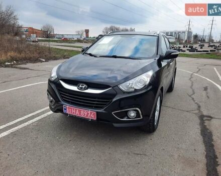 Чорний Хендай іх35, об'ємом двигуна 2 л та пробігом 211 тис. км за 12700 $, фото 6 на Automoto.ua
