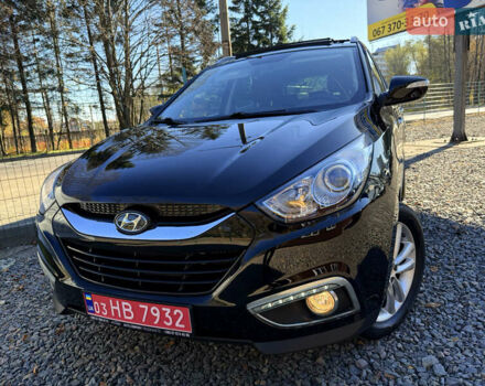 Чорний Хендай іх35, об'ємом двигуна 2 л та пробігом 153 тис. км за 13999 $, фото 1 на Automoto.ua