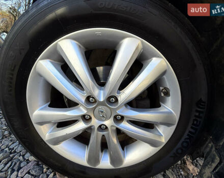 Чорний Хендай іх35, об'ємом двигуна 2 л та пробігом 153 тис. км за 13999 $, фото 10 на Automoto.ua