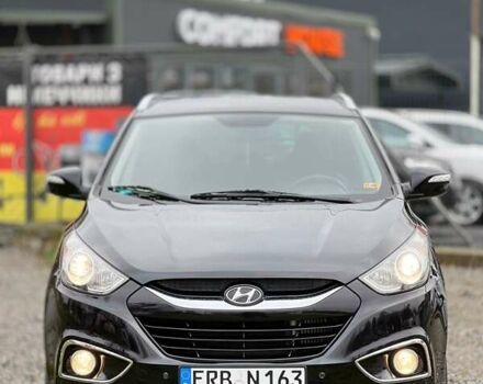 Чорний Хендай іх35, об'ємом двигуна 2 л та пробігом 195 тис. км за 12800 $, фото 23 на Automoto.ua