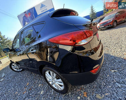 Чорний Хендай іх35, об'ємом двигуна 2 л та пробігом 153 тис. км за 13999 $, фото 86 на Automoto.ua