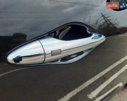 Чорний Хендай іх35, об'ємом двигуна 2 л та пробігом 211 тис. км за 12700 $, фото 104 на Automoto.ua