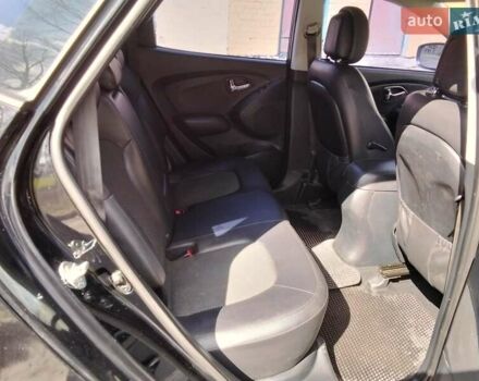 Чорний Хендай іх35, об'ємом двигуна 2 л та пробігом 180 тис. км за 12999 $, фото 8 на Automoto.ua