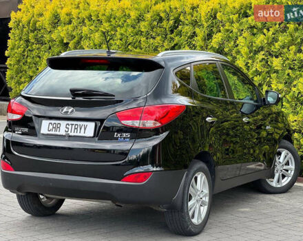Черный Хендай их35, объемом двигателя 1.69 л и пробегом 238 тыс. км за 11999 $, фото 2 на Automoto.ua