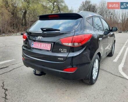 Чорний Хендай іх35, об'ємом двигуна 2 л та пробігом 211 тис. км за 12700 $, фото 15 на Automoto.ua