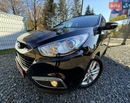 Чорний Хендай іх35, об'ємом двигуна 2 л та пробігом 153 тис. км за 13999 $, фото 2 на Automoto.ua